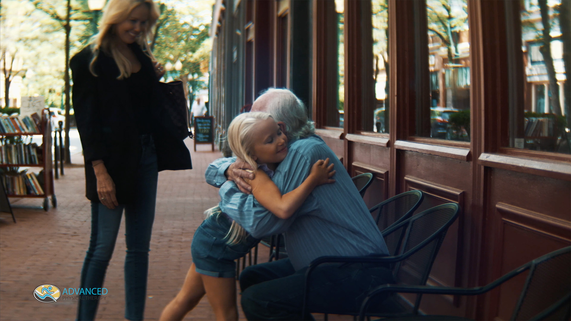 Child hugging grandparent